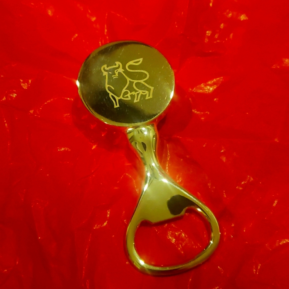Silver golf ball bottle opener